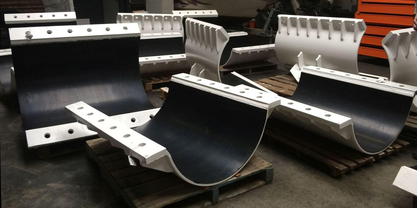 Buoyancy and riser clamps pioneering spirit with Ridderflex lining Buoyancy and riser clamps pioneering spirit with Ridderflex lining